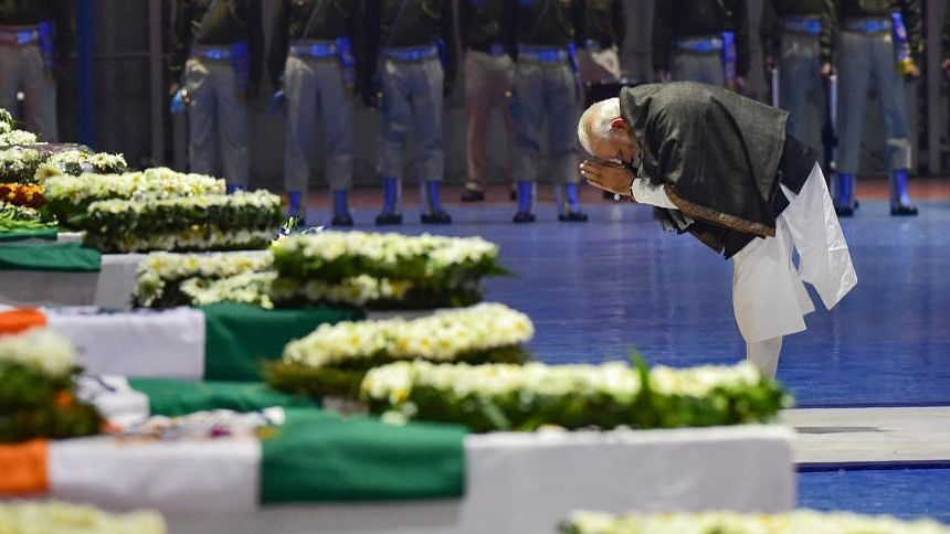 <div class="paragraphs"><p>Prime Minister Narendra Modi pays tribute to the martyred CRPF jawans, who lost their lives in  Pulwama terror attack, after their mortal remains were brought at AFS Palam in New Delhi, Feb 15, 2019.</p></div>