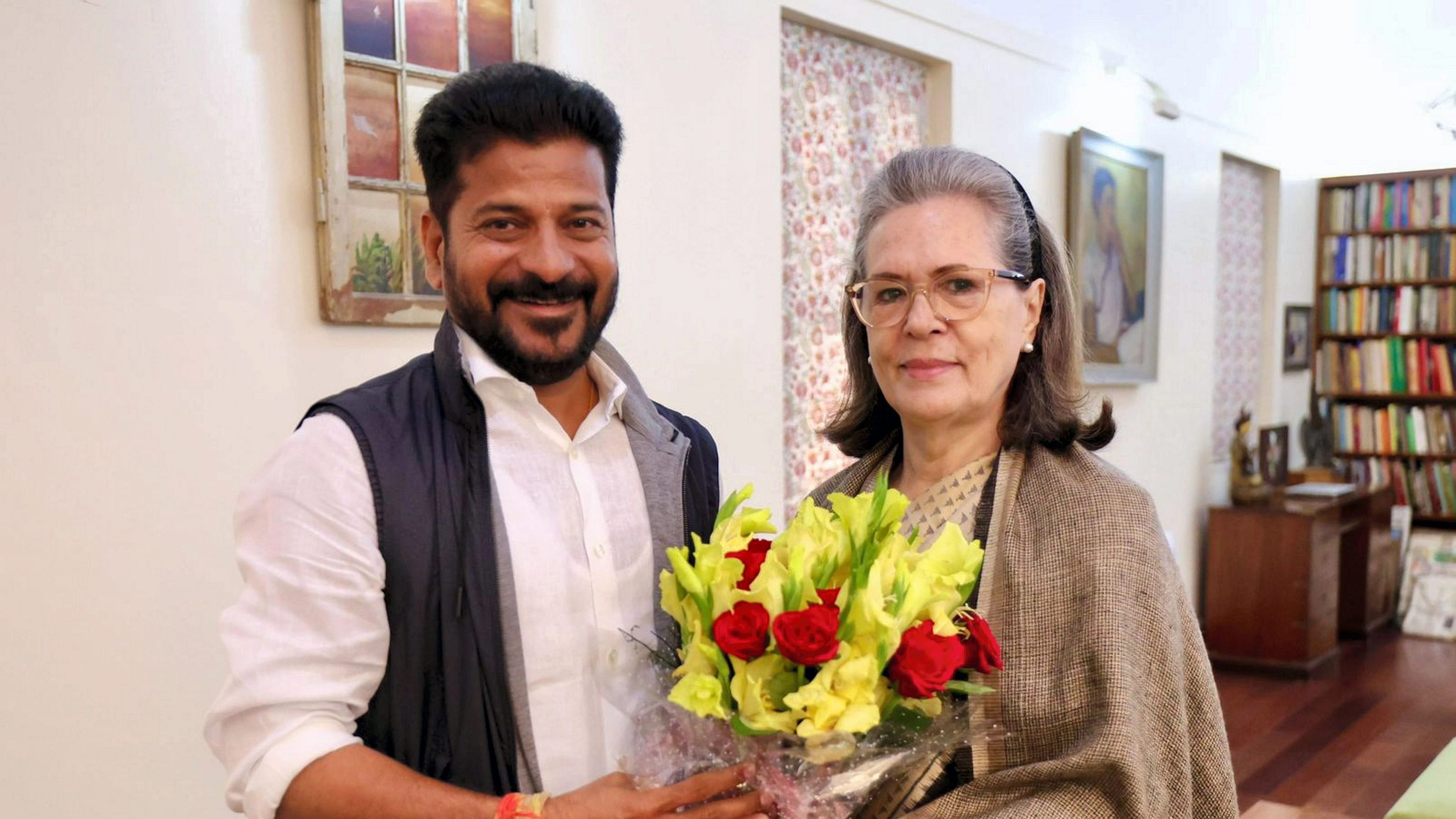 <div class="paragraphs"><p>File Photo: Senior Congress leader Sonia Gandhi with party's Telangana CM A Revanth Reddy. </p></div>