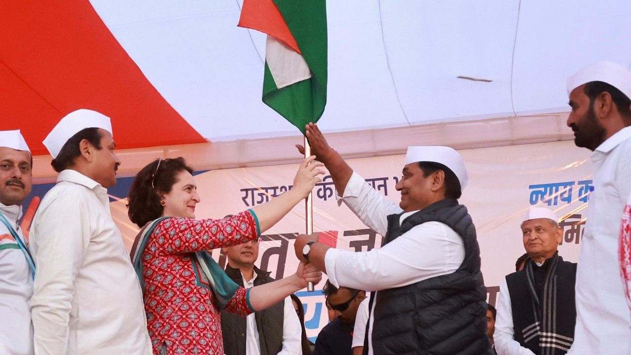 <div class="paragraphs"><p>Priyanka Gandhi handing over the national flag to Rajasthan Pradesh Congress Committee chief Govind Dotasra.&nbsp;</p></div>