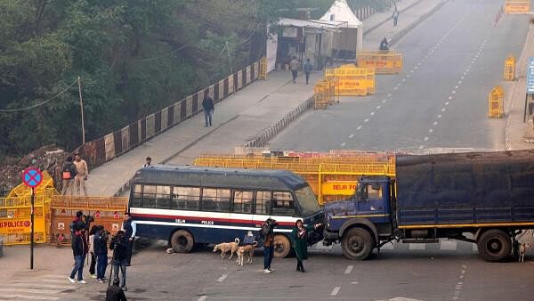 <div class="paragraphs"><p>Police barricades put up at Ghazipur border in view of farmers' 'Delhi Chalo March', in New Delhi, Monday, February 12, 2024. A large number of farmers from Uttar Pradesh, Haryana and Punjab are expected to march towards the national capital on Tuesday.</p></div>