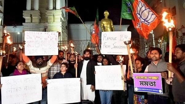 <div class="paragraphs"><p>BJP activists stage a protest against TMC workers who allegedly disrespected 'the modesty of women' in Sandeshkhali, in Kolkata, Saturday, February 10, 2024.</p></div>