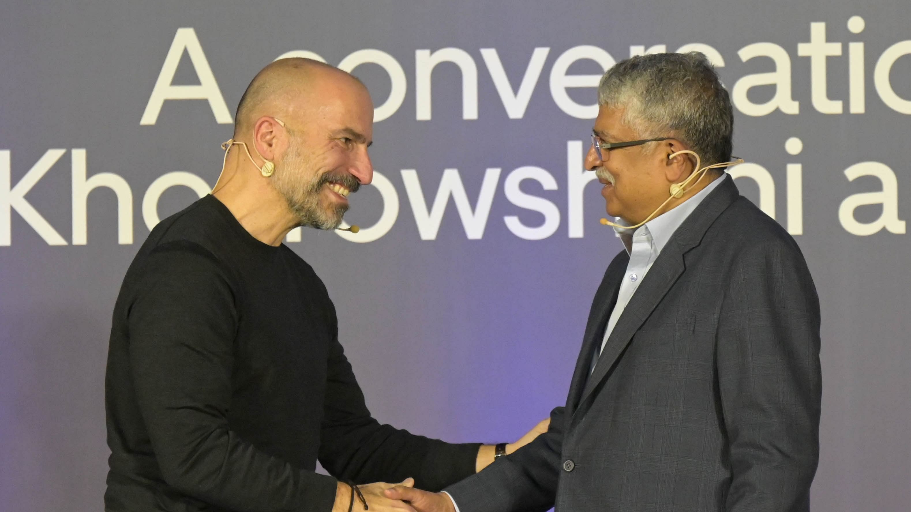 <div class="paragraphs"><p>Infosys Chairman Nandan Nilekani (Right) and Uber CEO Dara Khosrowshahi (Left) in Bengaluru on Thursday. </p></div>