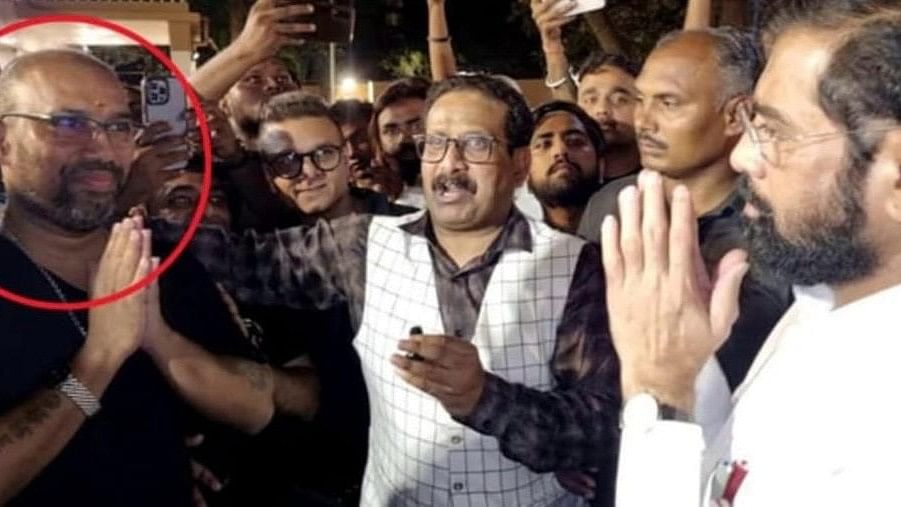 <div class="paragraphs"><p>Eknath Shinde with the accused who shot Shiv Sena (UBT) leader&nbsp;Abhishek Ghosalkar. <em>(DH has not independently verified the authenticity of the photo shared by Raut.)</em></p></div>