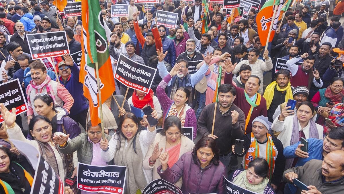 <div class="paragraphs"><p>BJP supporters raise slogans during a protest against the AAP, in New Delhi.</p></div>