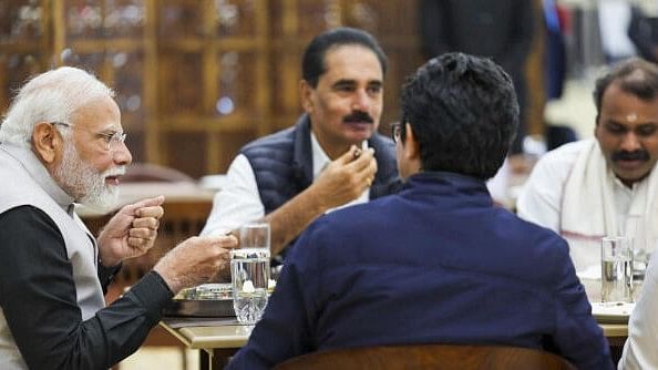 <div class="paragraphs"><p>Prime Minister Narendra Modi and MPs have lunch at Parliament Canteen during the Budget session, in New Delhi, Friday, Feb. 9, 2024.</p></div>