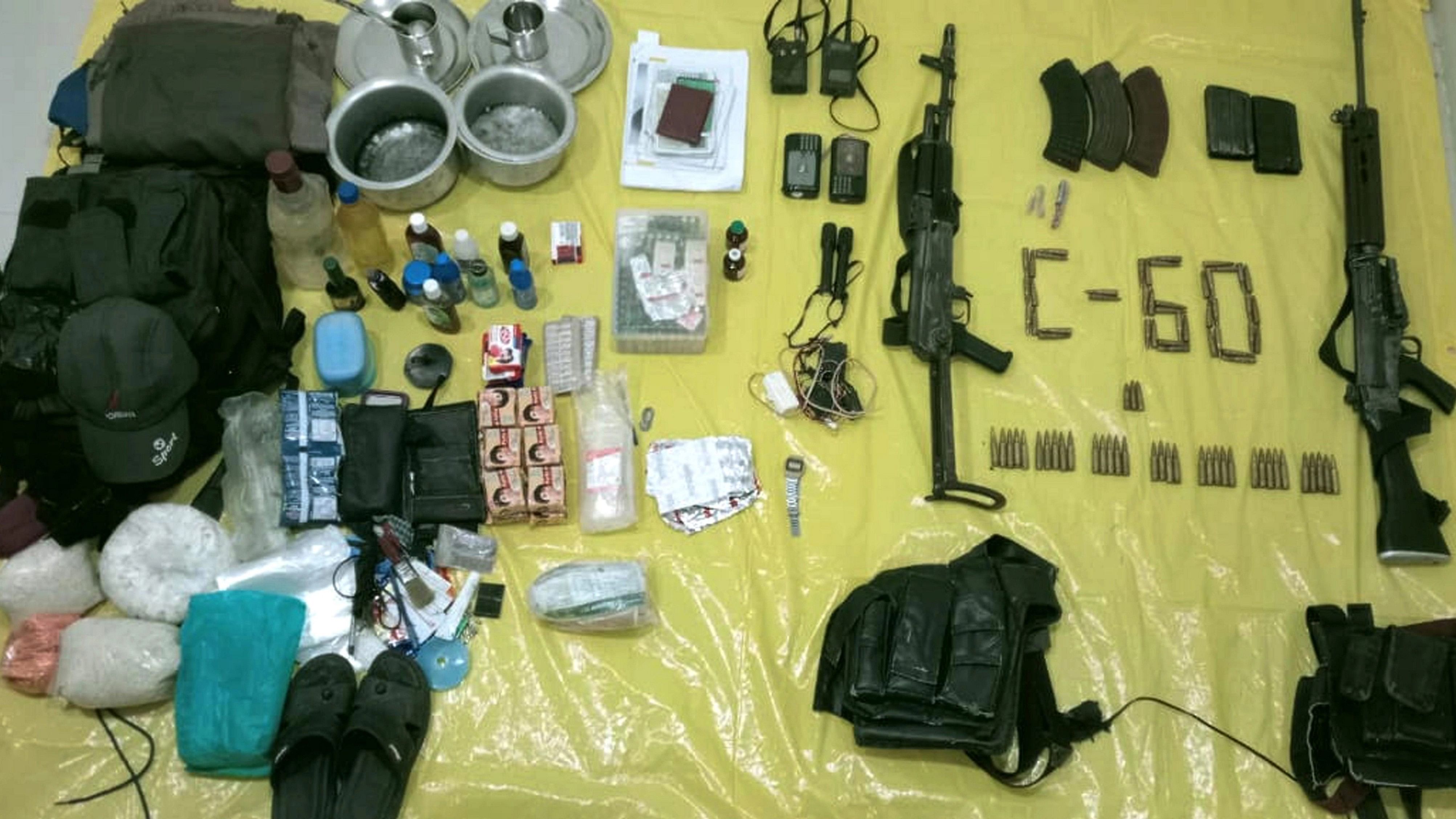 <div class="paragraphs"><p>Recoverd AK47 with SLR weapon and other materials after two Naxals were killed in an encounter with Maharashtra Police, at Bodhintola village in Gadchiroli district on Thursday.</p></div>