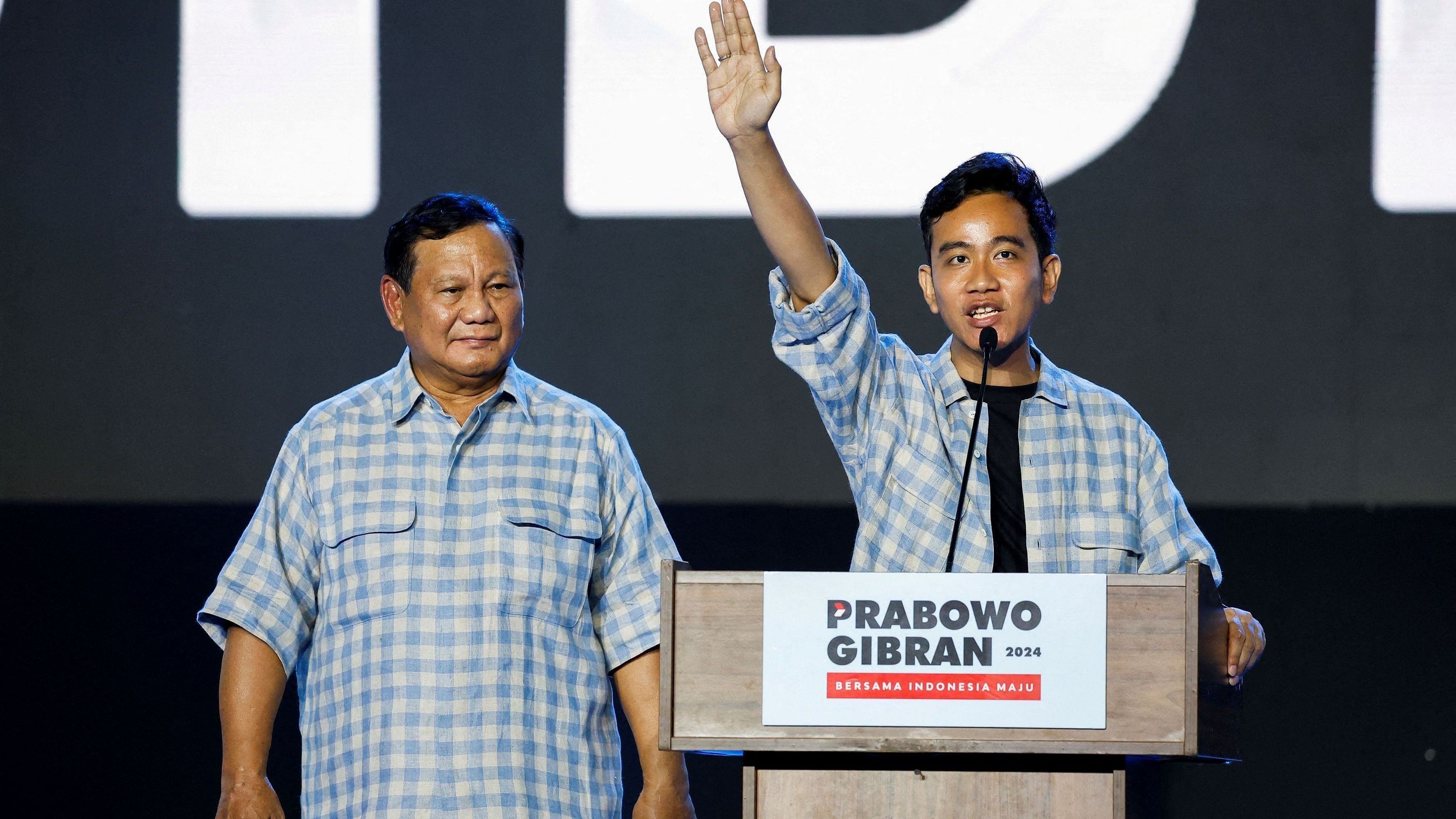 <div class="paragraphs"><p>Vice president candidate Gibran Rakabuming Raka, the eldest son of&nbsp;Indonesian President Joko Widodo and current Surakarta's Mayor, delivers his speech as Indonesia's Defence Minister and leading Presidential candidate Prabowo Subianto stands, at an event showing the quick-count results of the general election in Jakarta, Indonesia, February 14, 2024. </p></div>