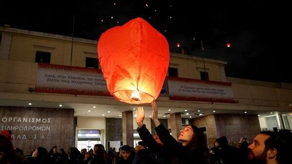 <div class="paragraphs"><p>People release 57 hot-air lanterns in front of the main train station in Athens, to mark the one-year anniversary of a deadly train crash, which killed 57 people, in Athens, Greece, February 28, 2024. </p></div>