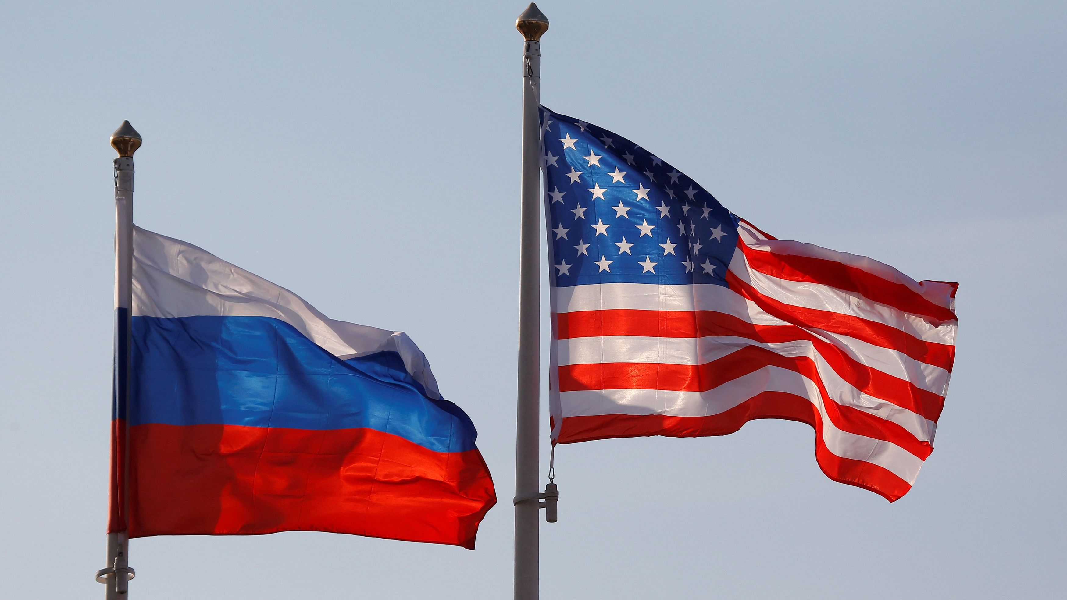 <div class="paragraphs"><p>Flags of Russia and United states</p></div>