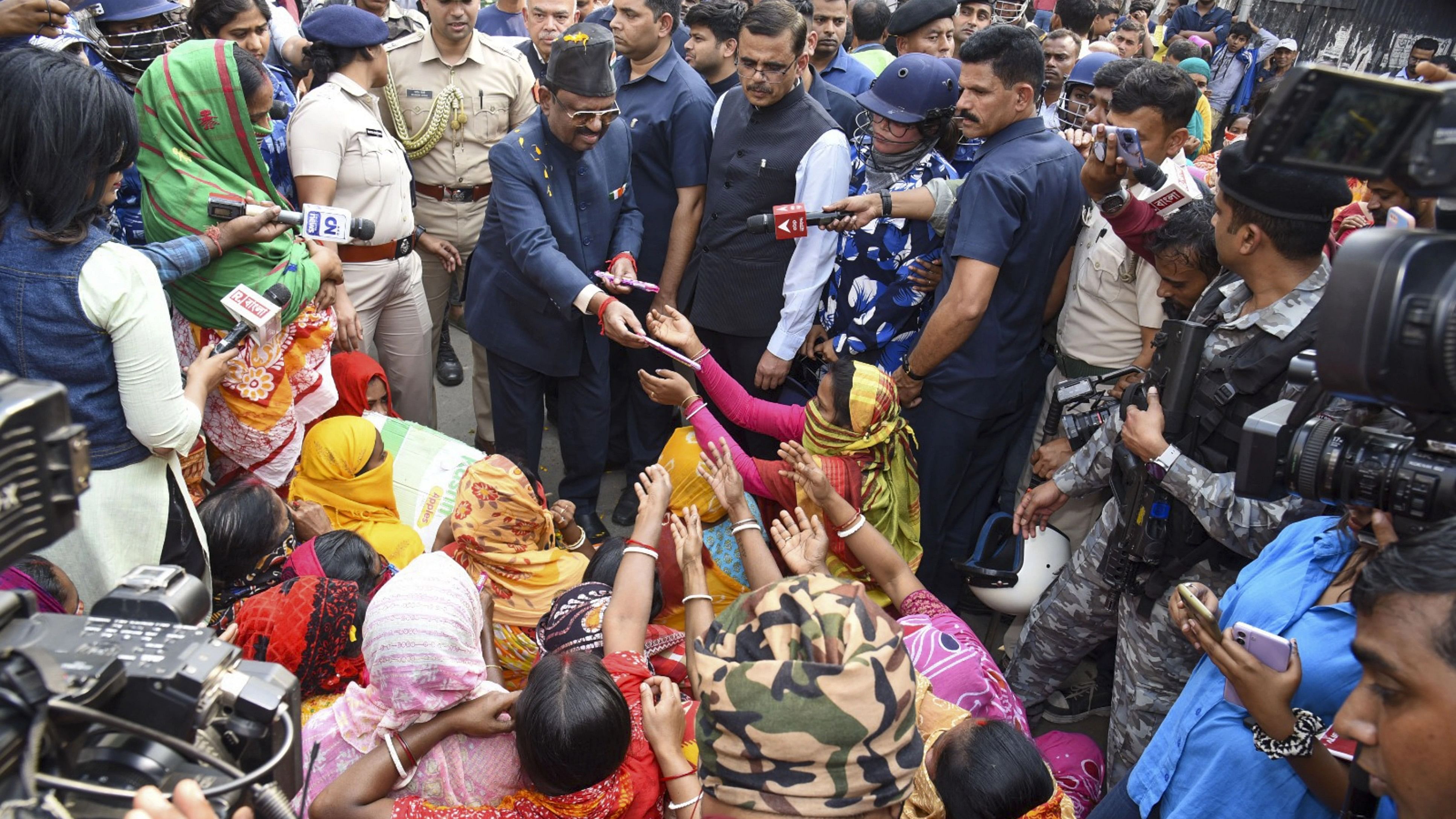 <div class="paragraphs"><p>Women protestors in Sandeshkhali, who alleged sexual harassment and torture by absconding TMC leader Shajahan Sheikh and his associates, meeting West Bengal Governor CV Ananda Bose.</p></div>