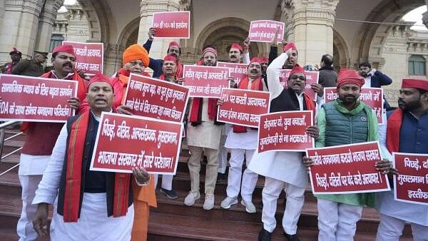 <div class="paragraphs"><p>Samajwadi Party leaders stage a protest during the Budget session of the Uttar Pradesh Assembly, at Vidhan Bhawan in Lucknow, Friday, February 2, 2024.</p></div>