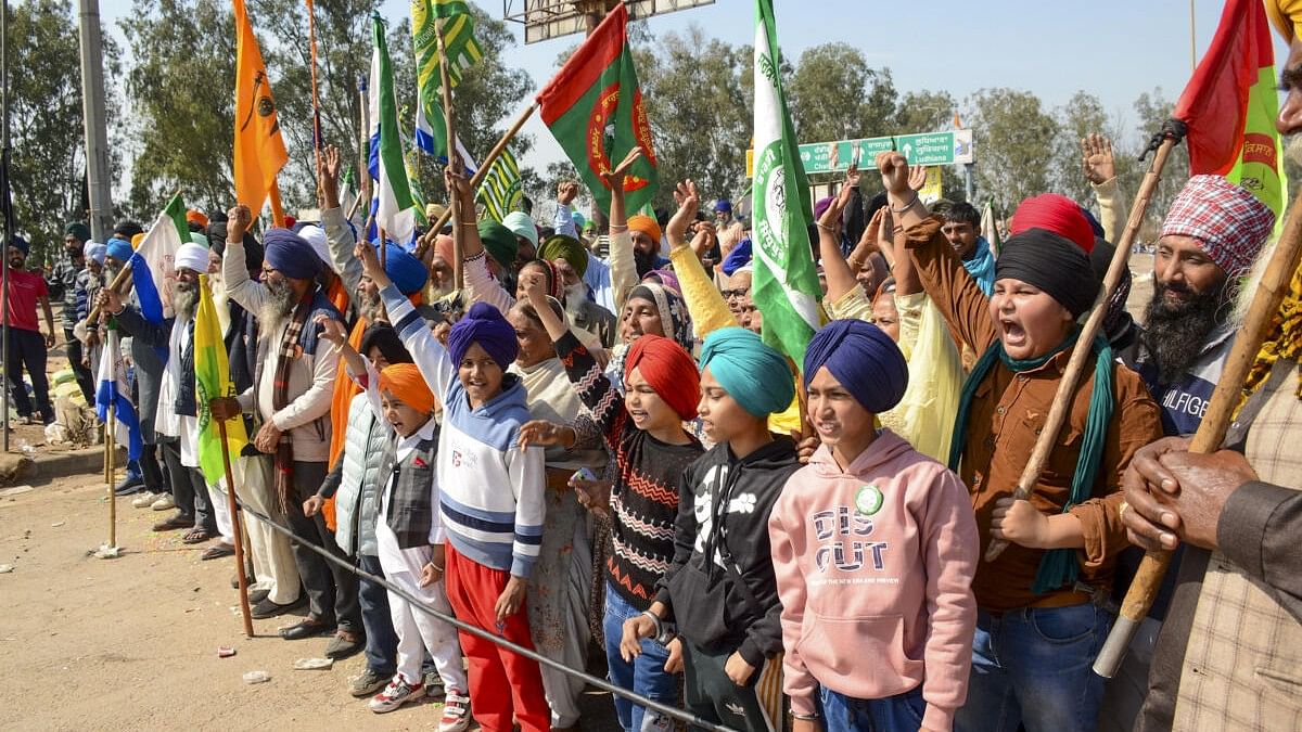 <div class="paragraphs"><p>Farmers along with family members stage a protest during their 'Delhi Chalo' march, near the Punjab-Haryana Shambhu border.</p></div>