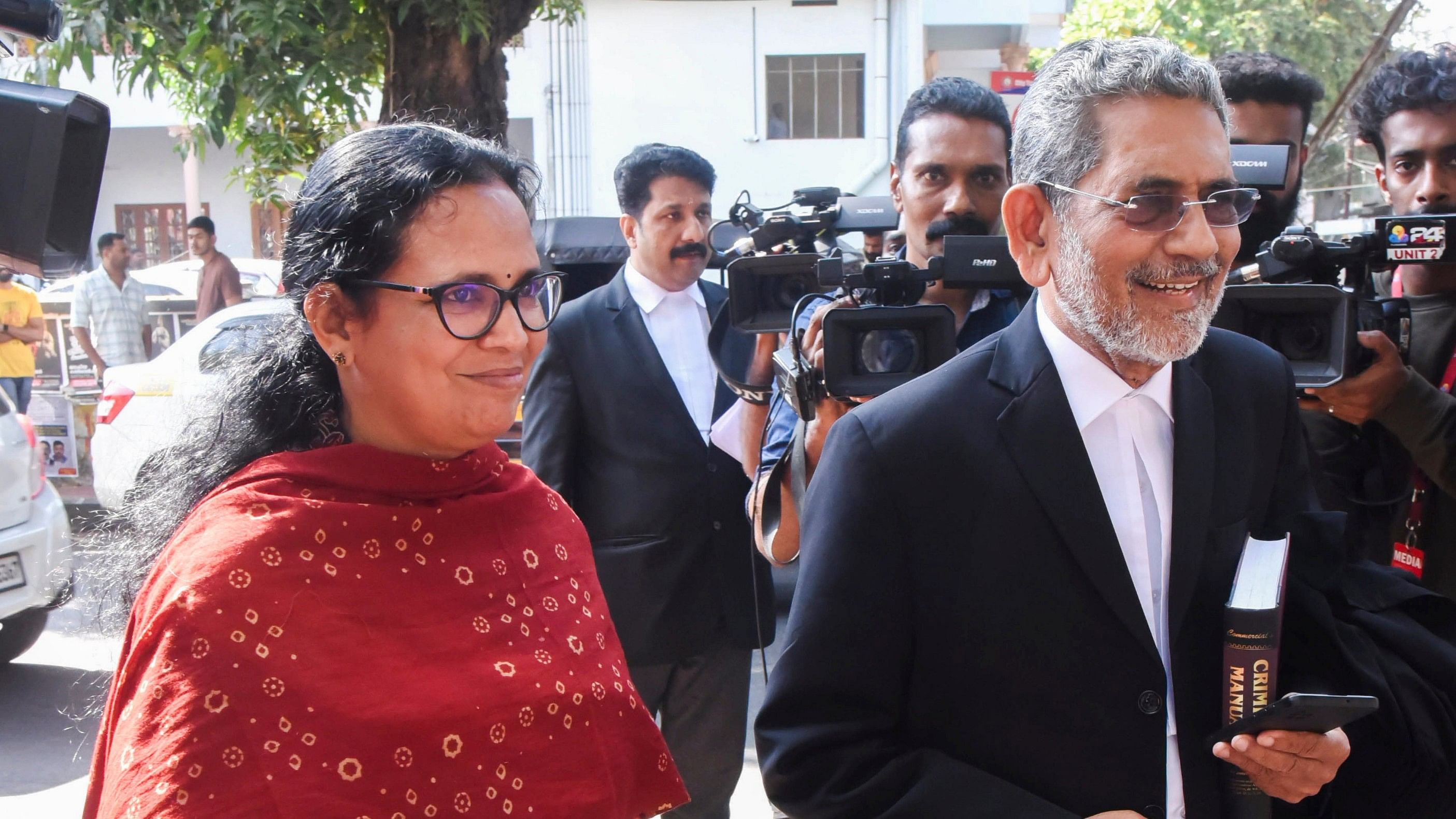 <div class="paragraphs"><p>T P Chandrasekaran's wife and Revolutionary Marxist Party of India MLA K K Rema with her lawyer comes to the Kerala High Court in Kochi.</p></div>