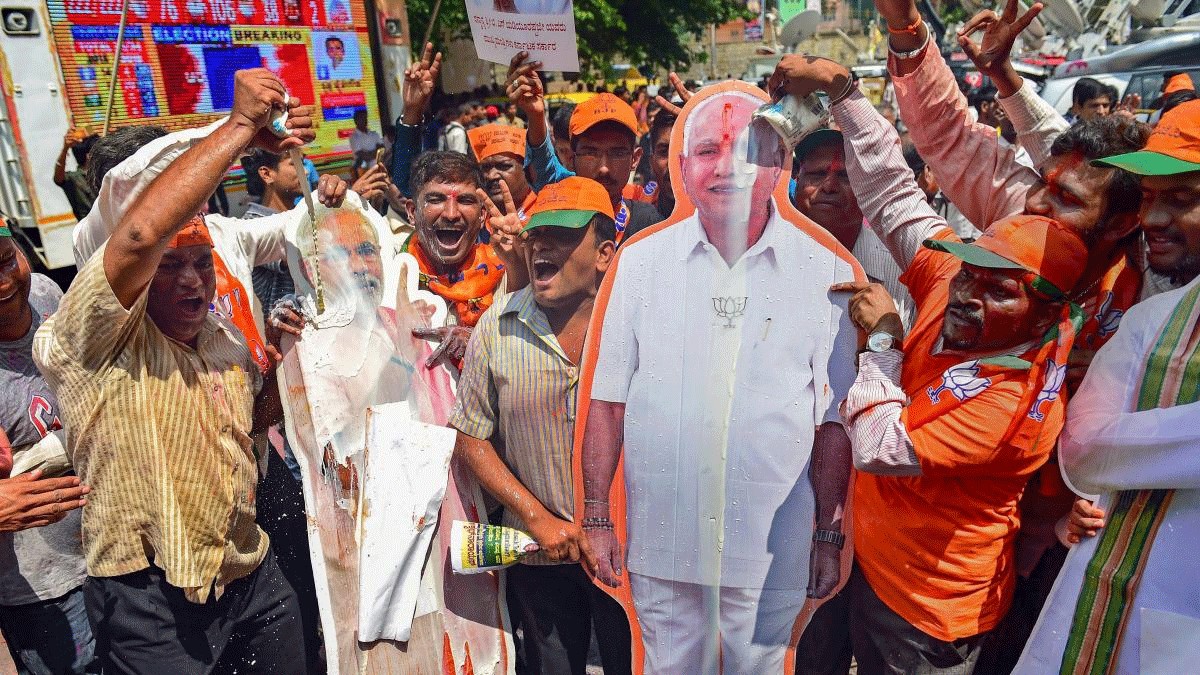 <div class="paragraphs"><p>BJP party workers offer milk 'abhishek' to cut-outs of Prime Minister Narendra Modi and BJP state unit President BS Yediyurappa.</p></div>