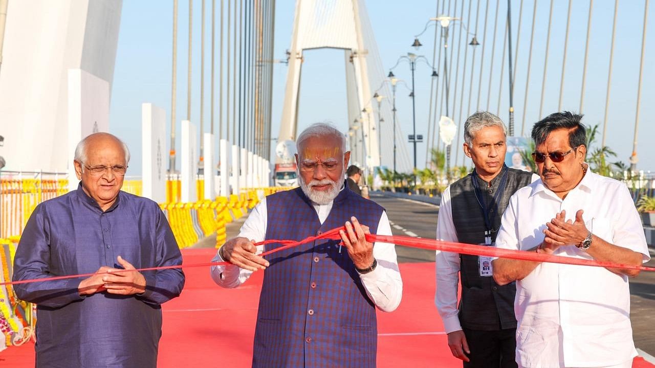 <div class="paragraphs"><p>Modi began his day by offering prayers at Lord Sri Krishna temple at Beyt Dwarka. He later inaugurated the four-lane cable-stayed bridge called the 'Sudarshan Setu'.</p></div>