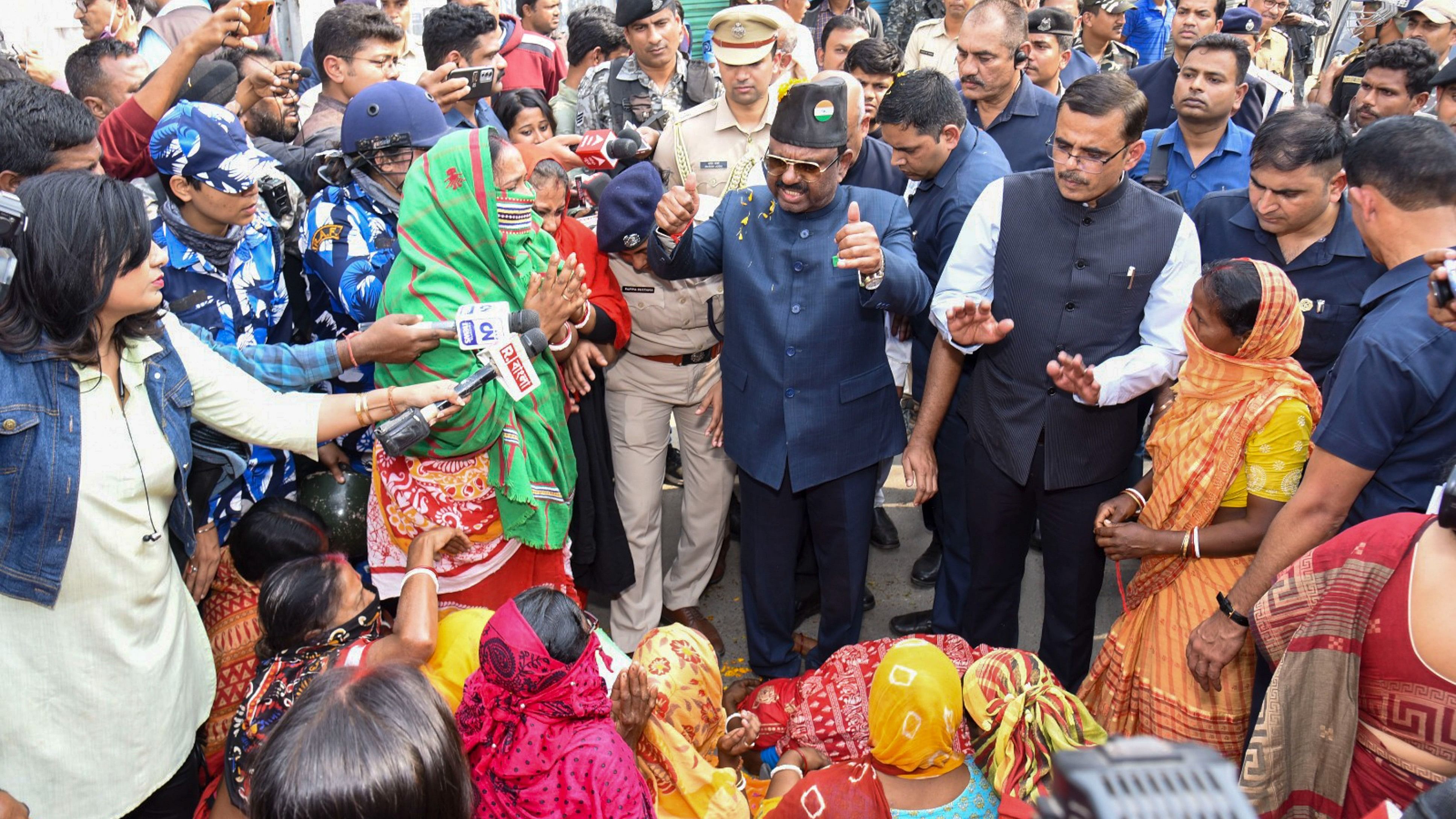 <div class="paragraphs"><p>West Bengal Governor CV Ananda Bose interacts with women protestors at Sandeshkhali block, in North 24 Parganas district.</p></div>