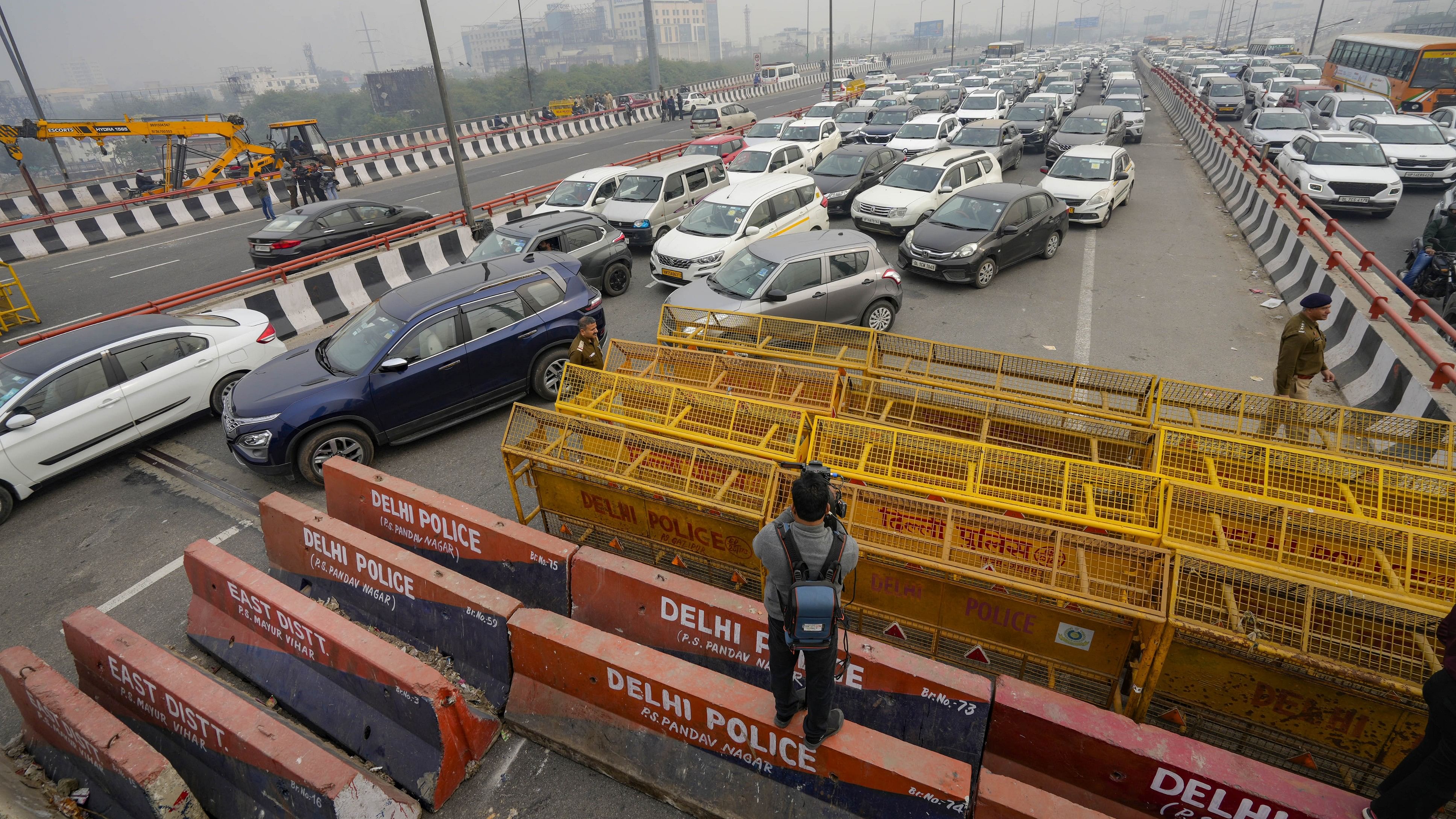 <div class="paragraphs"><p>Traffic jam on roads at Delhi-Ghazipur border due to traffic restrictions in the view of farmers' protest march, in Ghaziabad, on Tuesday.</p></div>