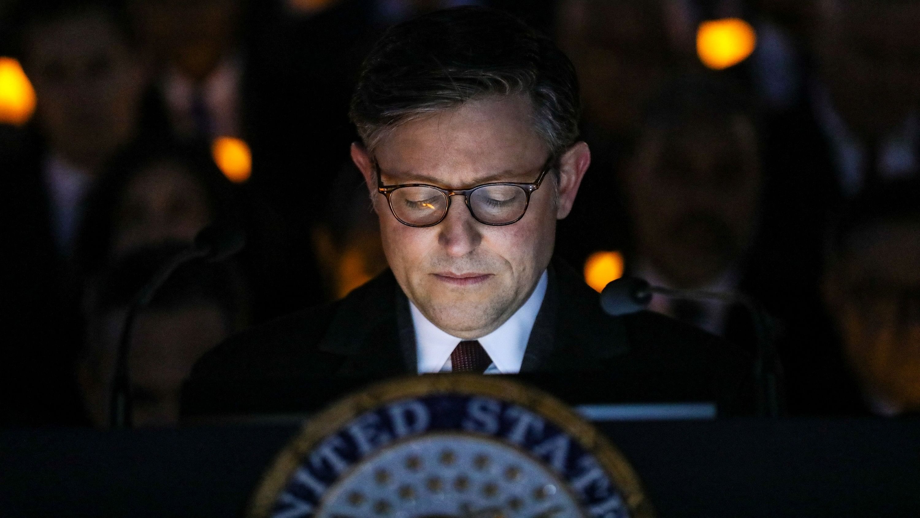 <div class="paragraphs"><p>US&nbsp;House Speaker Mike Johnson  holds a moment of silence during a vigil held on the steps of the US House of Representatives with family members of hostages and victims of Hamas, in Washington, US, January 17, 2024. </p></div>