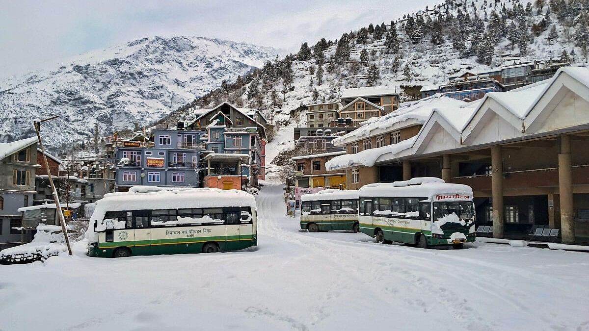 <div class="paragraphs"><p>Himachal Road Transport Corporation (HRTC) buses are covered in snow at a locality at Keylong after fresh snowfall, in Lahaul and Spiti district.</p></div>