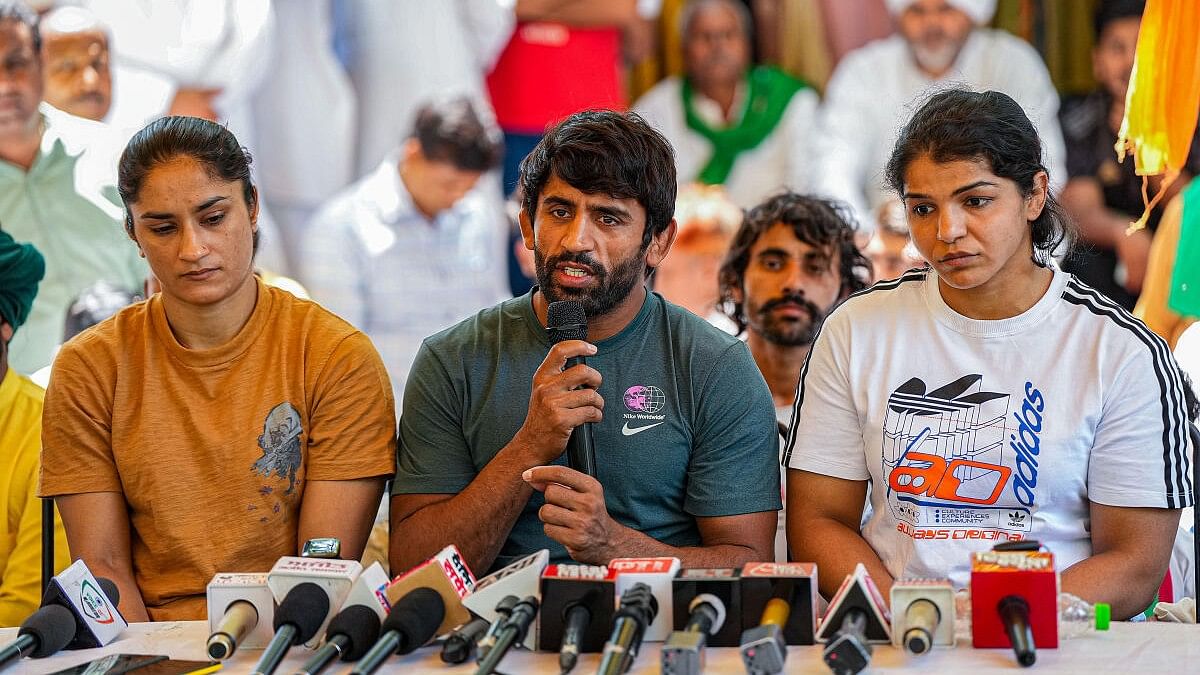 <div class="paragraphs"><p>Wrestlers Bajrang Punia, Vinesh Phogat and Sakshi Malik</p></div>