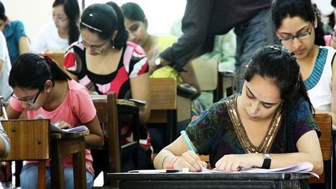 <div class="paragraphs"><p>Representative image of studentsduring exam.</p></div>