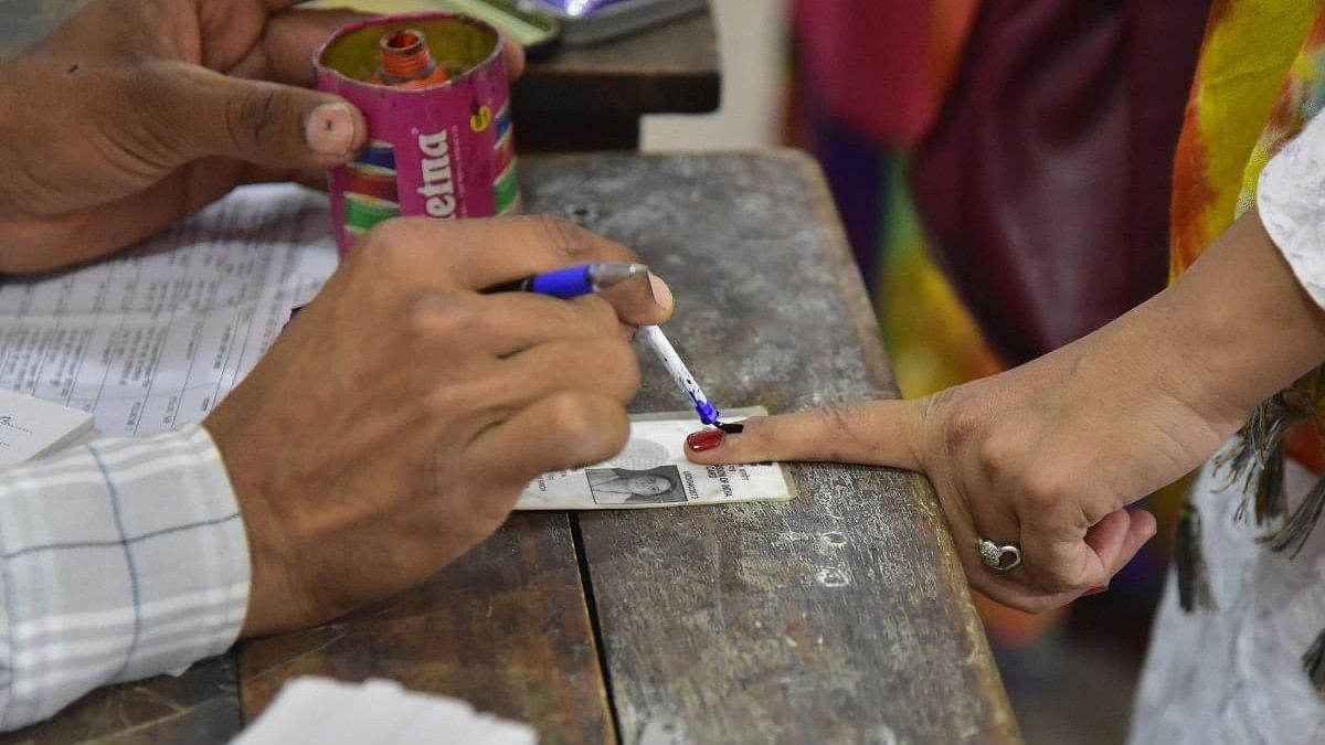 <div class="paragraphs"><p>A voter gets her finger marked in Rajasthan.</p></div>