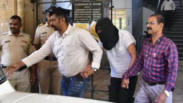 <div class="paragraphs"><p>Amarendra Mishra, bodyguard of social activist Mauris Noronha whose pistol was allegedly used in the murder of Shiv Sena (UBT) leader Abhishek Ghosalkar, after he was produced in the Esplanade Court, in Mumbai, Saturday, February 10, 2024.</p></div>