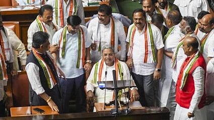 <div class="paragraphs"><p>Karnataka Chief Minister Siddaramaiah with Deputy CM DK Shivkumar and other ministers and legislators while presenting the State Budget 2024-25 in the Assembly, in Bengaluru, Friday, February 16, 2024.</p></div>