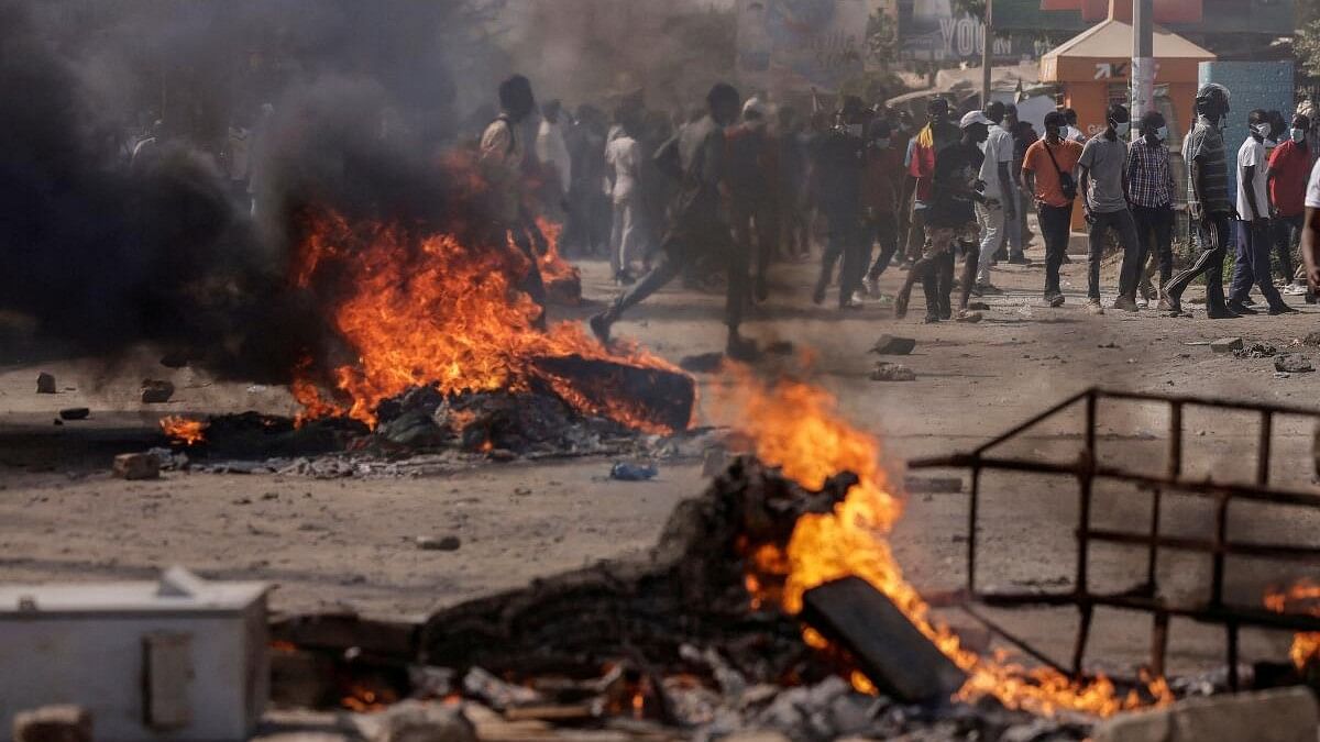 <div class="paragraphs"><p>Senegalese demonstrators protest against the postponement of the February 25 presidential election, in Dakar.</p></div>