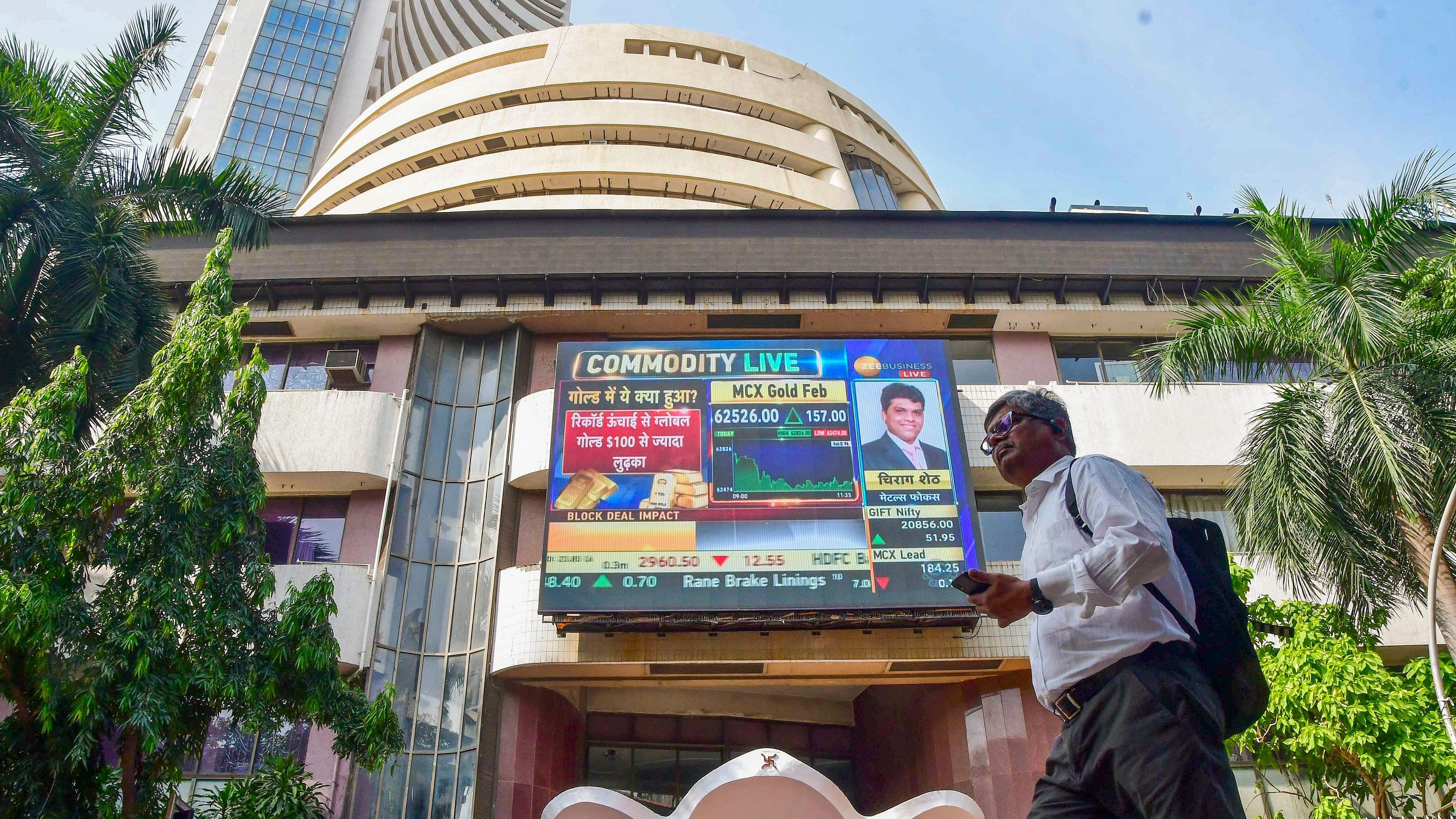 <div class="paragraphs"><p>Mumbai: A man walks past the Bombay Stock Exchange (BSE) building, in Mumbai.</p></div>