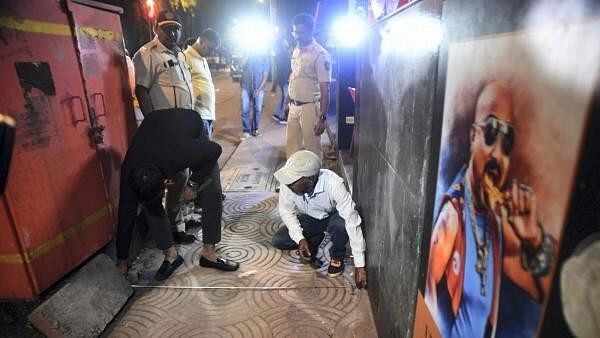 <div class="paragraphs"><p>Police personnel at the site where Shiv Sena (UBT) leader Vinod Ghosalkar's son Abhishek was shot, in Mumbai, Thursday, February 8, 2024.</p></div>