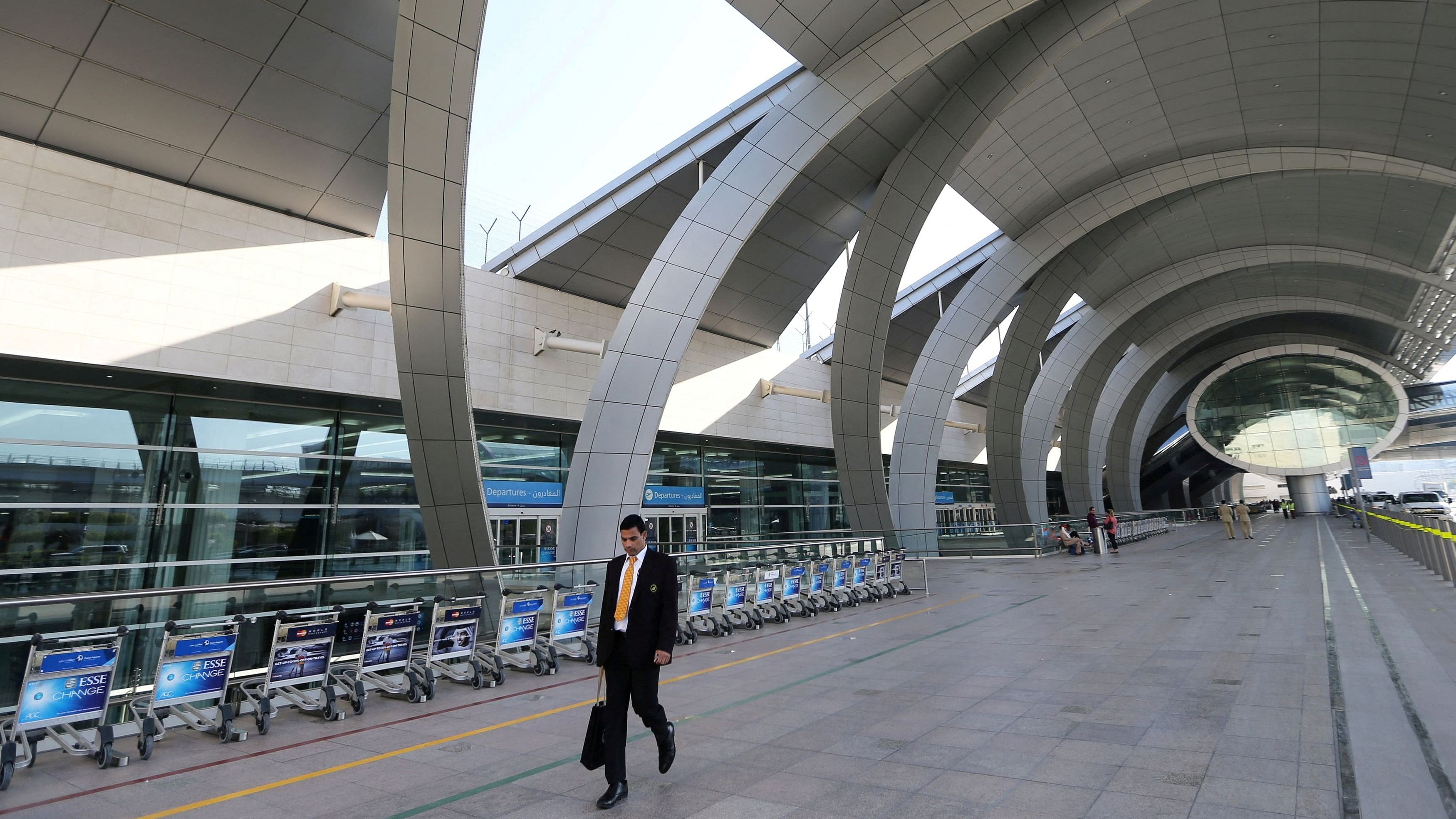 <div class="paragraphs"><p>A passenger is seen at the departure terminal three of Dubai Airport in Dubai, United Arab Emirates.</p></div>