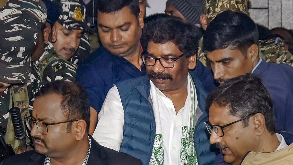 <div class="paragraphs"><p>Former Jharkhand CM and JMM leader Hemant Soren being taken to custody by Enforcement Directorate (ED) officials after he was produced before a PMLA court in a money laundering case, in Ranchi.</p></div>