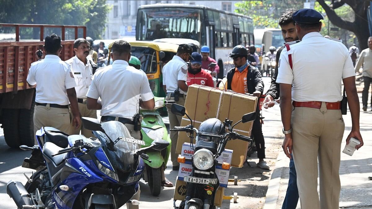 <div class="paragraphs"><p>Bengaluru Traffic Police personnel at work.</p></div>
