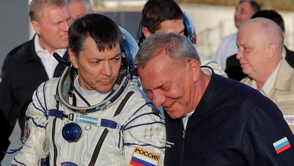 <div class="paragraphs"><p>Cosmonaut Oleg Kononenko seen here with&nbsp;Russian space agency Roscosmos chief Yuri Borisov.&nbsp;</p></div>