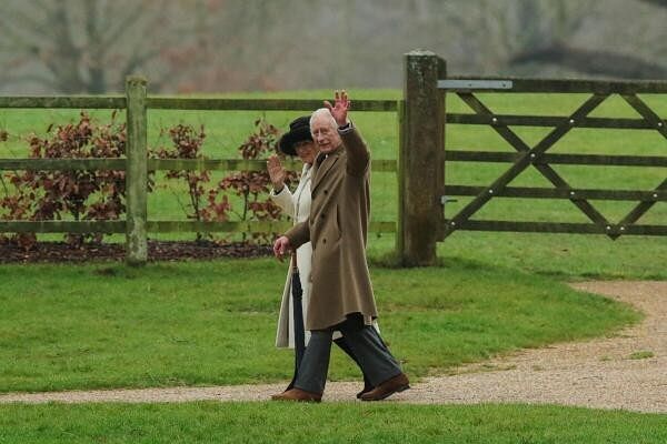 <div class="paragraphs"><p>Britain's King Charles and Queen Camilla greet as they walk after attending a church service, at St. Mary Magdalene's church on the Sandringham estate in eastern England, Britain, February 11, 2024.</p></div>