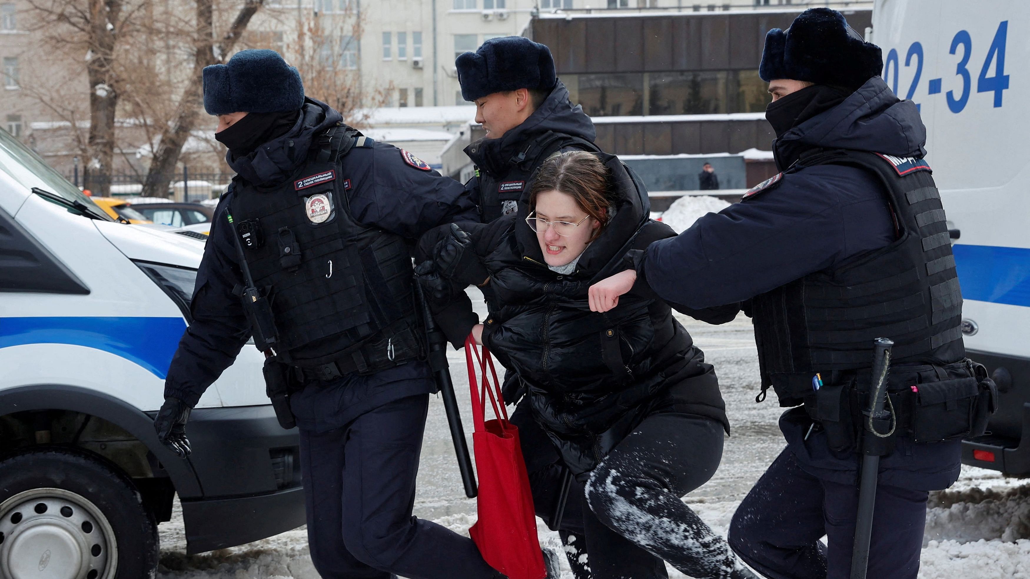 <div class="paragraphs"><p>Police officers detain a woman during a gathering in memory of Russian opposition leader Alexei Navalny near the Wall of Grief monument to the victims of political repressions in Moscow, Russia, February 17, 2024. </p></div>