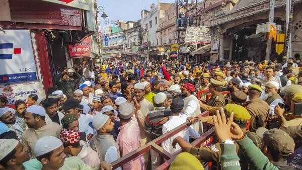 <div class="paragraphs"><p>Police personnel stop Muslims as they gather to offer 'namaz' at Gyanvapi Mosque, in Varanasi, Friday, February 2, 2024.</p></div>