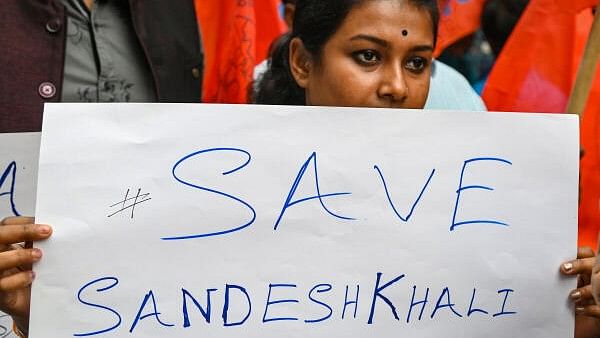 <div class="paragraphs"><p>People participate in a protest rally over Sandeshkhali incident, in Kolkata.</p></div>