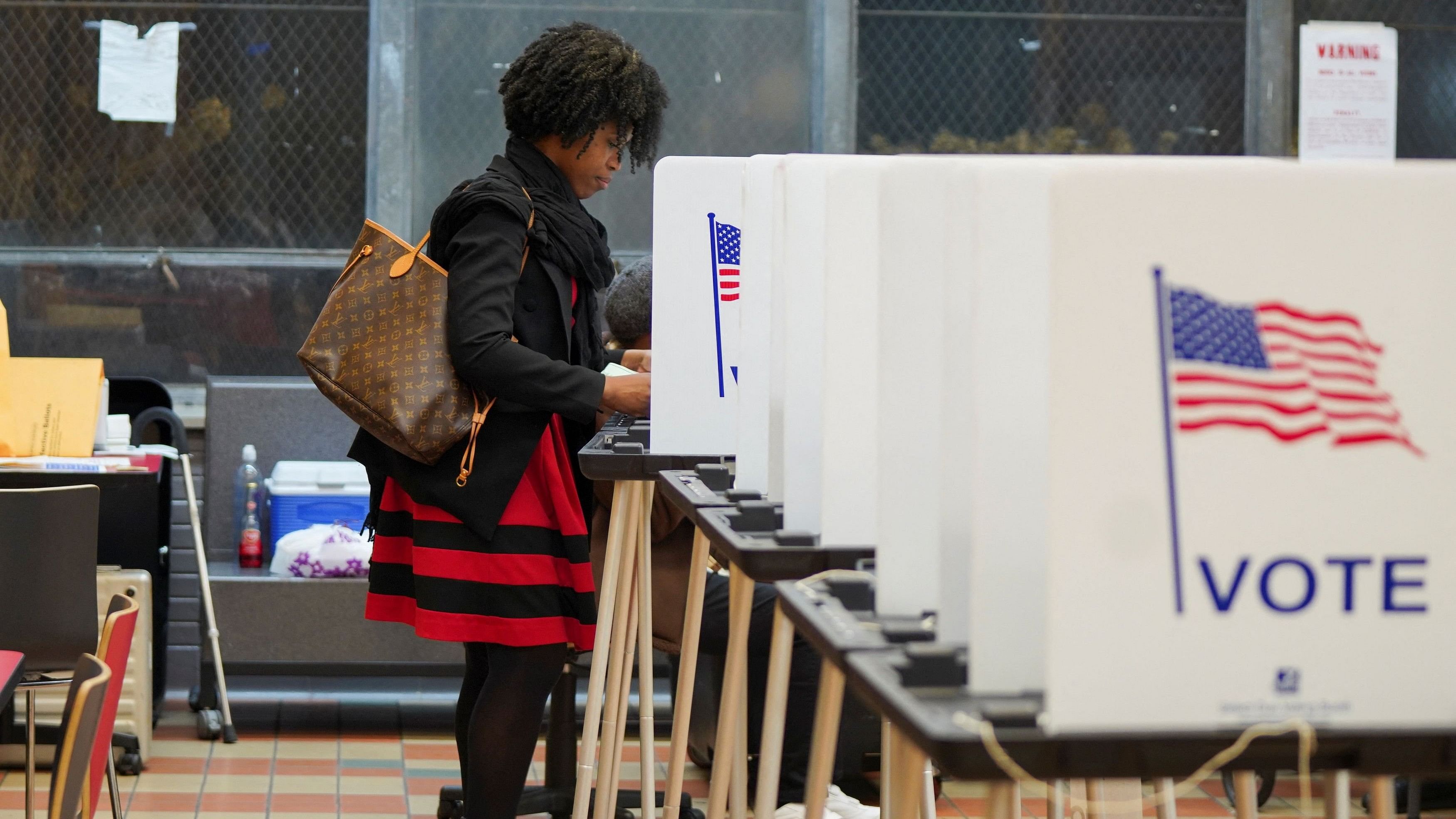 <div class="paragraphs"><p>A woman votes at a voting site as Democrats and Republicans hold their Michigan primary presidential election, in Detroit, Michigan, US February 27, 2024. </p></div>