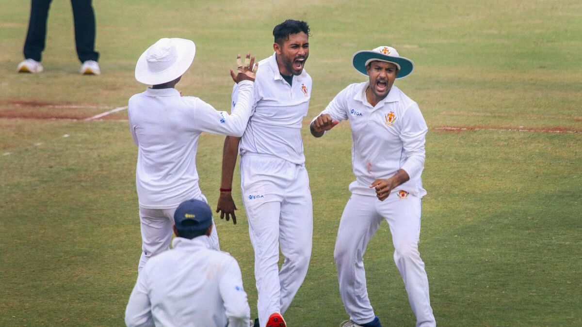 <div class="paragraphs"><p>Karnataka's bowler Vidhwath Kaverappa celebrates the wicket of Vidarbha's batter Harsh Dubey during the Ranji Trophy quarter-final match between Vidarbha and Karnataka, in Nagpur</p></div>