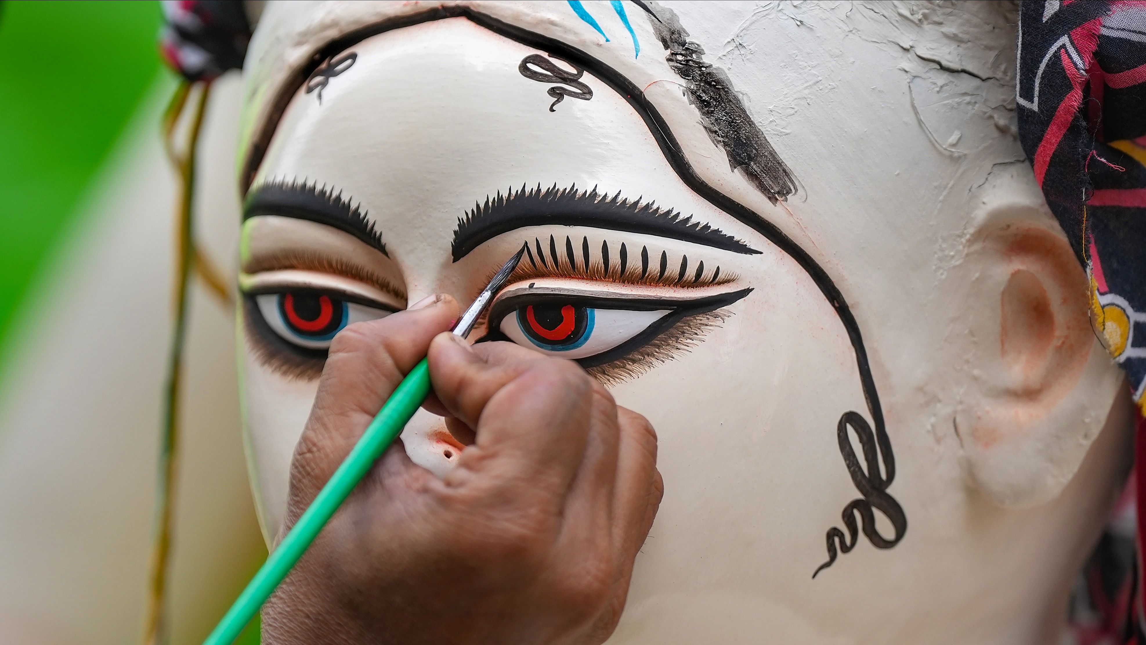 <div class="paragraphs"><p>A representative picture of an artist adding finishing touches to an idol of Goddess Saraswati.</p></div>