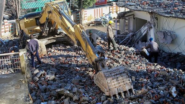 <div class="paragraphs"><p>Representative image of bulldozer demolishing illegal structure.</p></div>