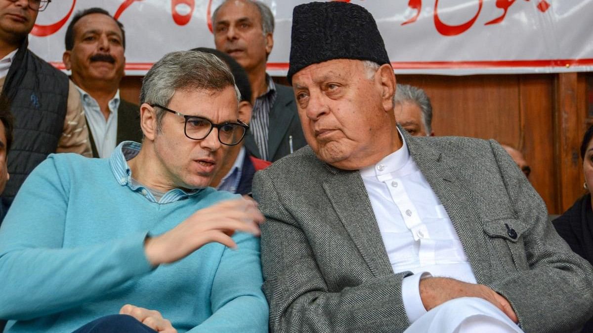 <div class="paragraphs"><p>National Conference President Farooq Abdullah with his son Omar Abdullah.</p></div>