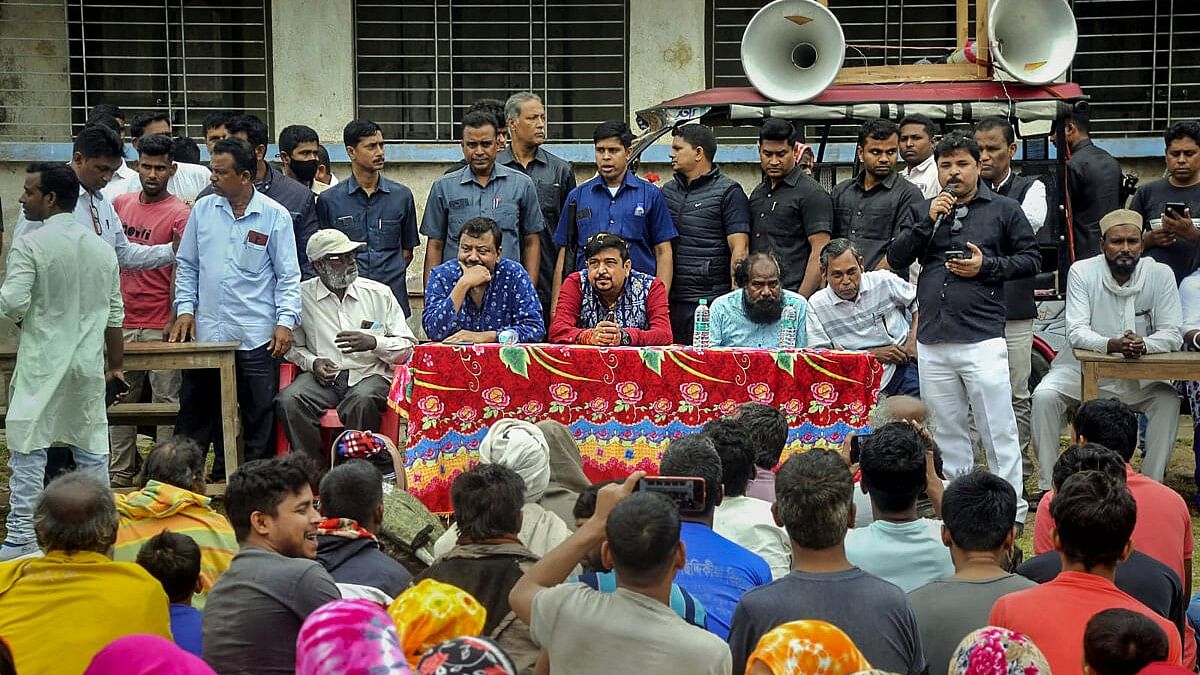 <div class="paragraphs"><p>TMC leaders Sujit Bose and Partha Bhowmick interact with villagers during their visit to Sandeshkhali, in North 24 Parganas district.</p></div>