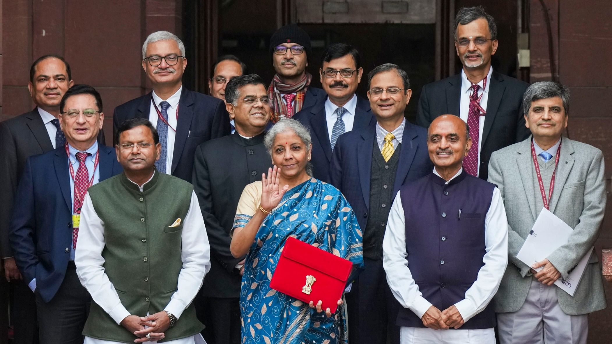 <div class="paragraphs"><p>Union Finance Minister Nirmala Sitharaman poses with her team.</p></div>
