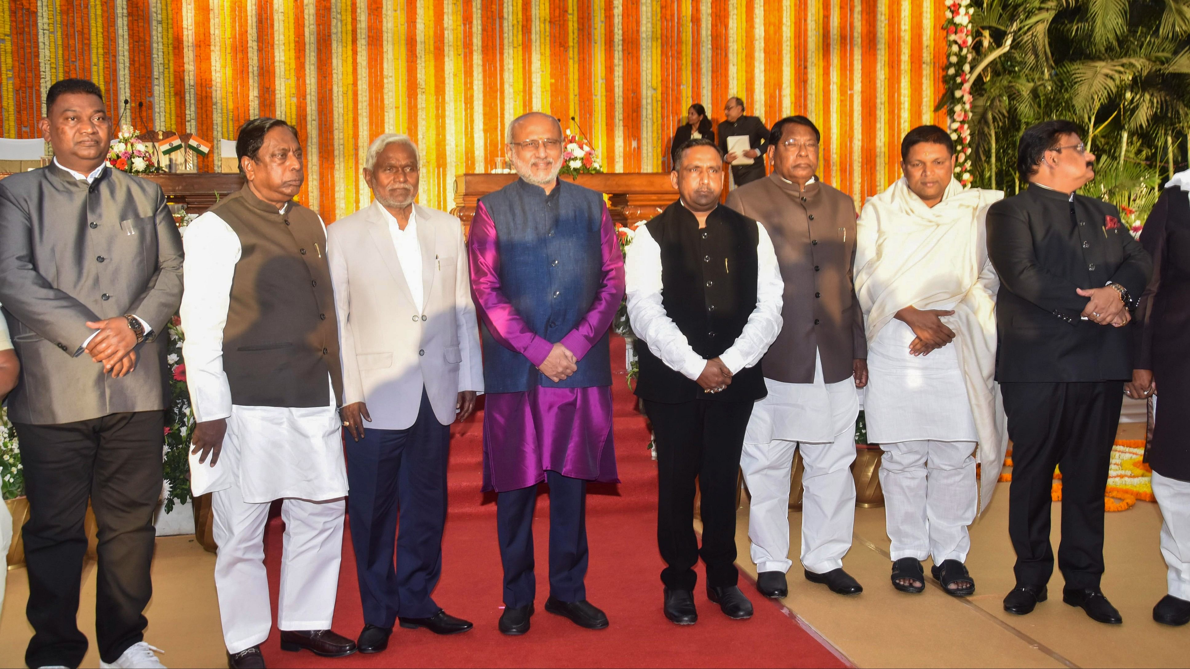 <div class="paragraphs"><p>Jharkhand Governor CP Radhakrishnan and Chief Minister Champai Soren pose for photos with the newly sworn-in state cabinet ministers at the Raj Bhavan, in Ranchi, on Friday.</p></div>