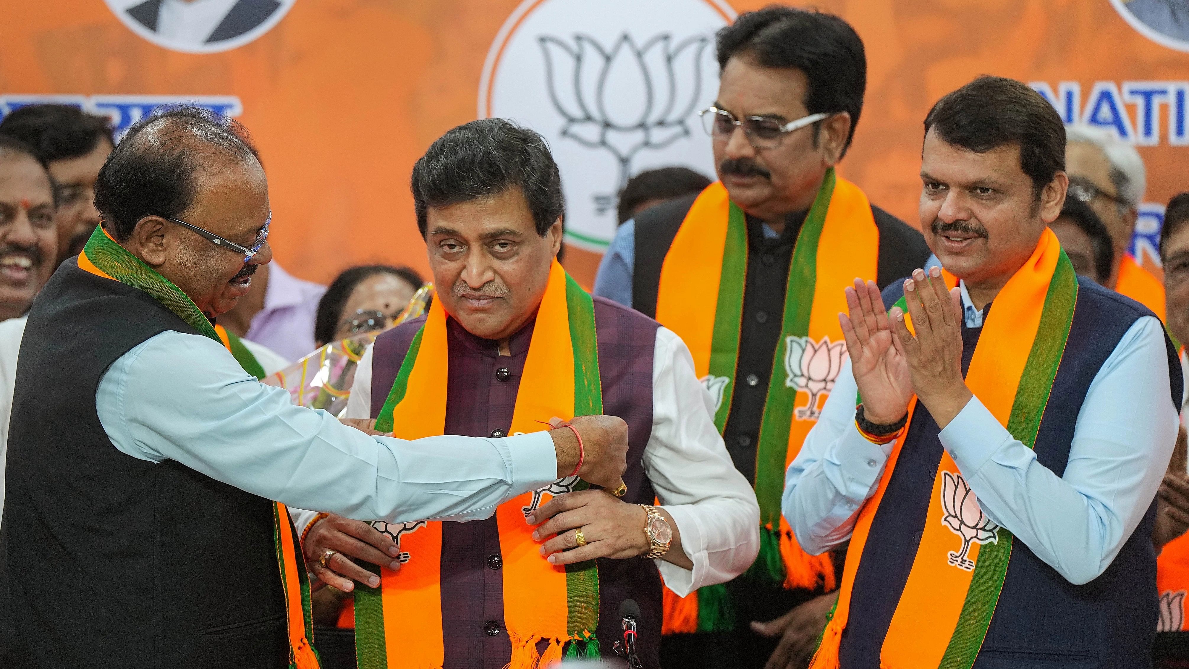 <div class="paragraphs"><p>Former Maharashtra CM and Congress leader Ashok Chavan joins BJP in the presence of Maharashtra Deputy Chief Minister Devendra Fadnavis and Maharashtra BJP President Chandrashekar Bawankule, in Mumbai, Tuesday, Feb. 13, 2024.</p></div>