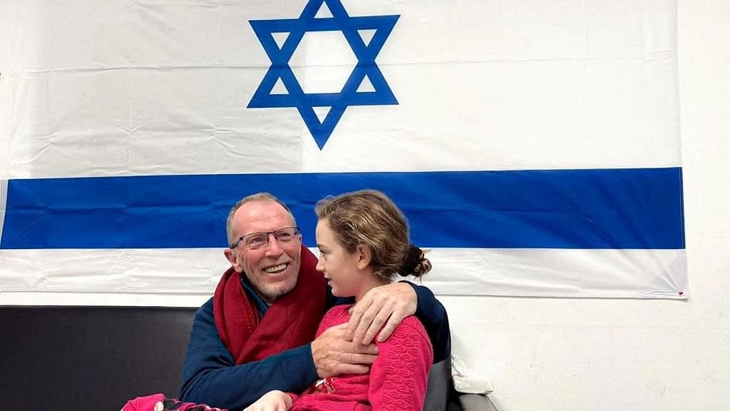 <div class="paragraphs"><p>Irish-Israeli girl Emily Hand, who was abducted by Hamas gunmen during the October 7 attack on Israel, meets her father Thomas Hand after being released as part of a hostages-prisoners swap deal between Hamas and Israel amid a temporary truce, at an unknown location in Israel, in this handout image released November 26, 2023.   </p></div>