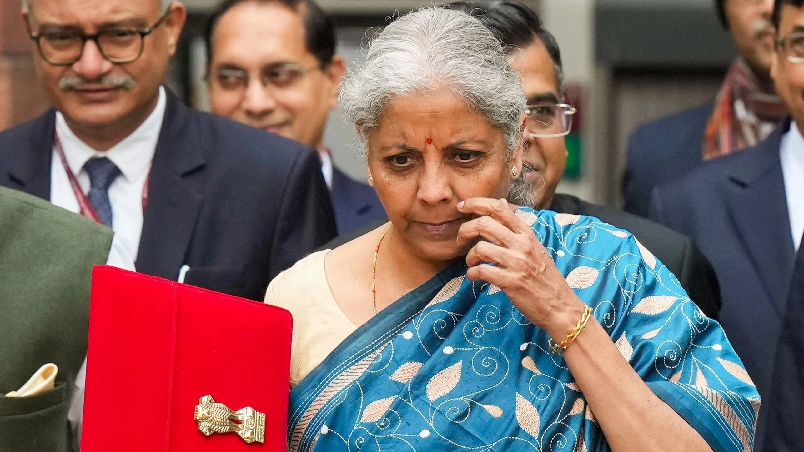 <div class="paragraphs"><p>Union Finance Minister Nirmala Sitharaman and other officials outside the Finance Ministry ahead of the presentation of Interim Budget 2024.</p></div>